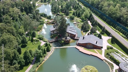 Aerial view, Mezhyhirya residence of the former president of Ukraine Viktor Yanukovych. Beautiful lakes with fountains. Drone photo