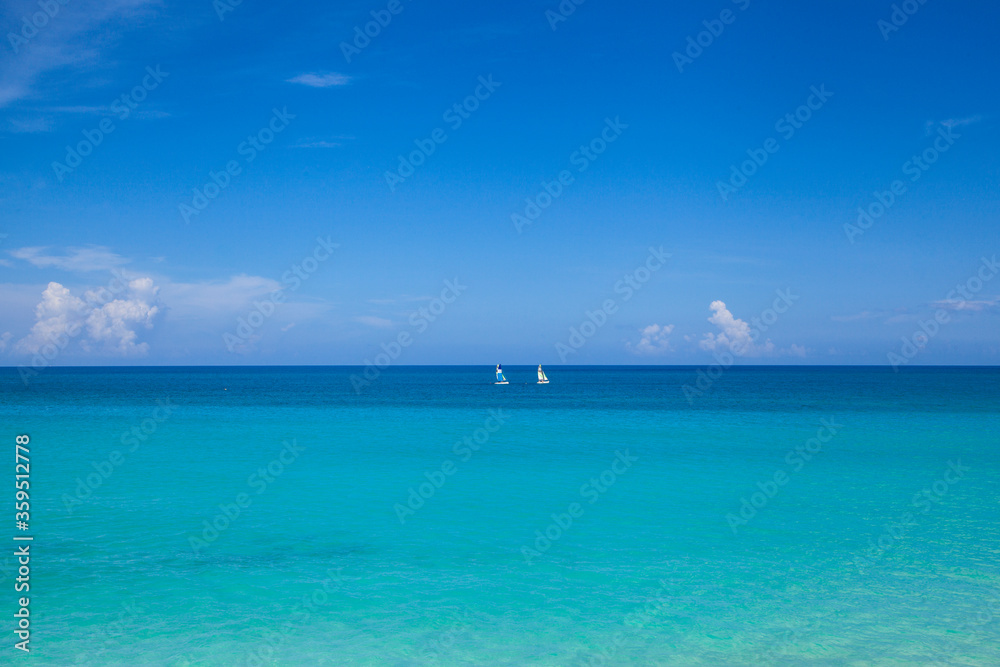 boats sailing in blue sea of Varadero, Cuba