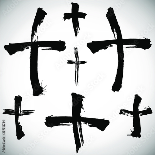 Grungy religion symbol. Set of black grungy crosses