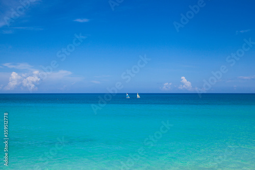 Fototapeta Naklejka Na Ścianę i Meble -  boats sailing in blue sea of Varadero, Cuba