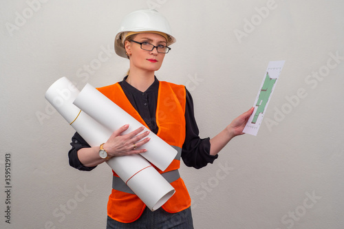 A girl in a construction he...
