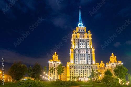Moscow. Russia. High-rise building in the center of Moscow against the black sky. Stalin's skyscrapers in the Russian capital. The building of hotel Ukraine in Moscow. Classical architecture.