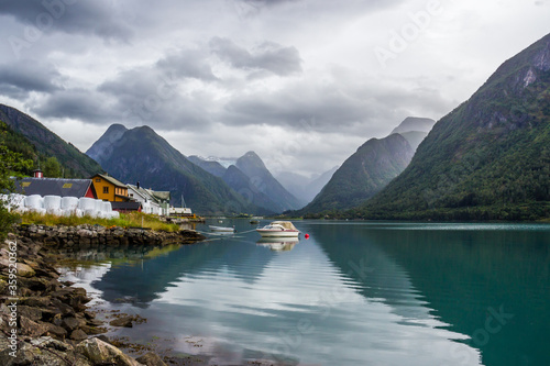 heavy clouds over the fjord in Norway photo