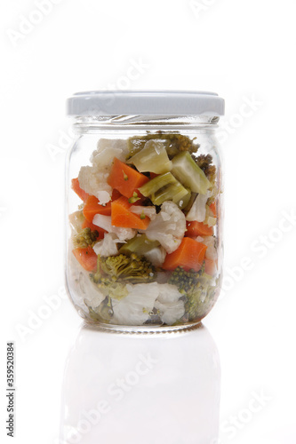Nutrition concept - Healthy meals in glass jars over white background. Healthy take-away lunch jar. 