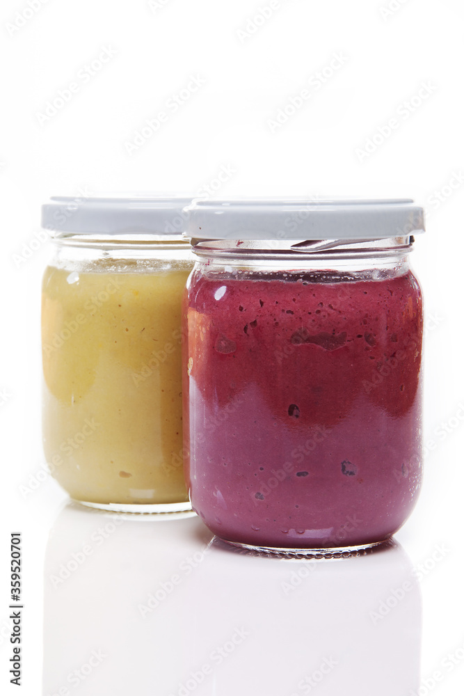 Nutrition concept - Healthy meals in glass jars over white background. Healthy take-away lunch jar. Nutrition concept - Healthy meals in glass jars over white background. Healthy take-away lunch jar.
