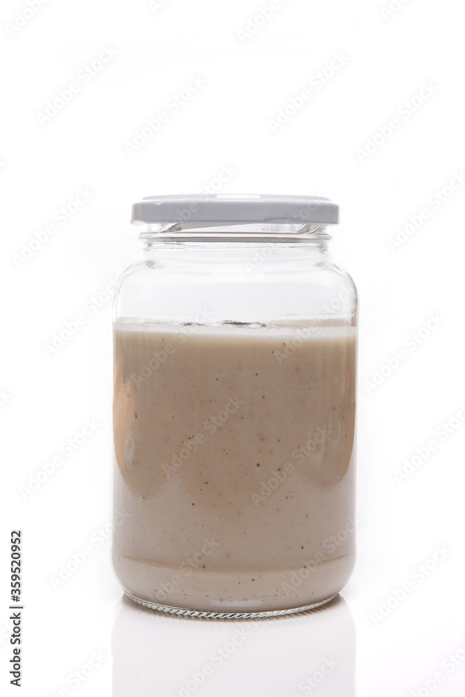 Nutrition concept - Healthy food, Diet, Detox, Clean Eating or Vegetarian concept. Glass jars of nutritious food against white background. Delicious soups in glass jars. Nutrition concept - Healthy food, Diet, Detox, Clean Eating or Vegetarian concept. Glass jars of nutritious food against white background. Delicious soups in glass jars.