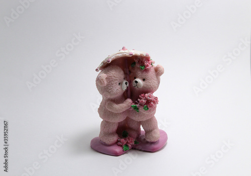 Decorative figurine bear on a white background