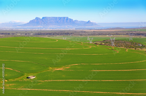 Cape Town, Western Cape / South Africa - 07/24/2017: Aerial photo of Malmesbury farming fields with Table Mountain in the background