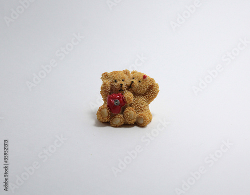 Decorative figurine bear on a white background
