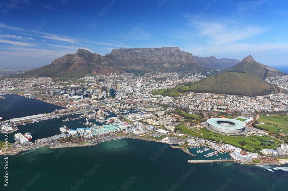 Obraz premium Cape Town, Western Cape / South Africa - 09/04/2017: Aerial photo of Sea Point and Cape Town Stadium with Table Mountain in the background