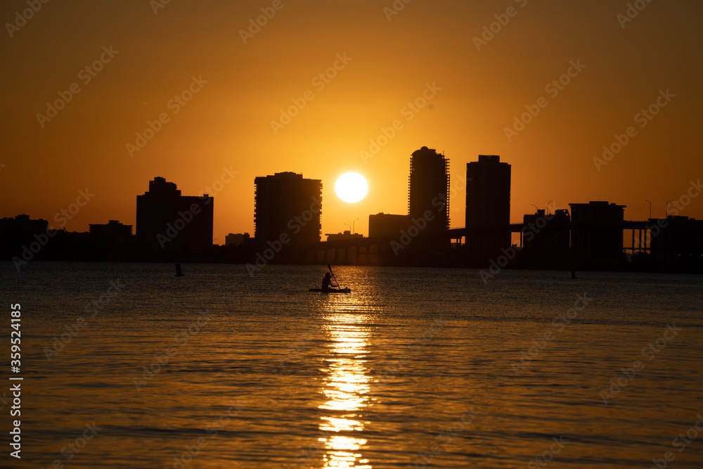 sunset over the city buildings  downtown miami florida sea sun summer 
