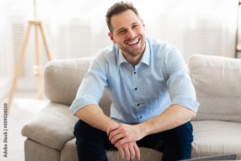 Man having rest at home on the sofa