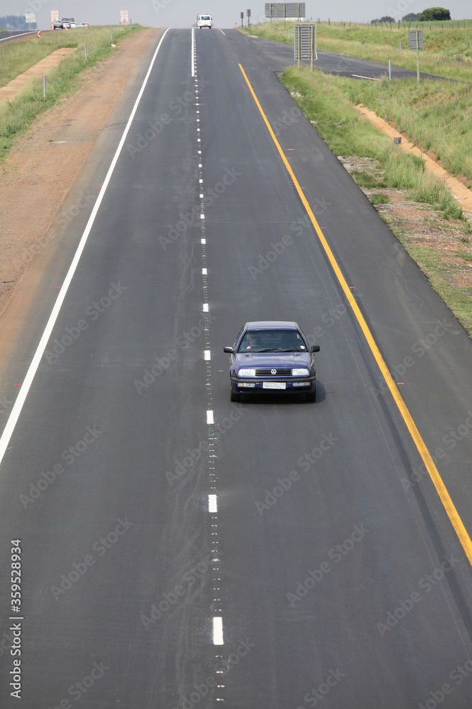 Durban, Kwa-Zulu Natal / South Africa - 11/26/2009: Aerial photo of a vehicle travelling along a road Durban, Kwa-Zulu Natal / South Africa - 11/26/2009: Aerial photo of a vehicle travelling along a road
