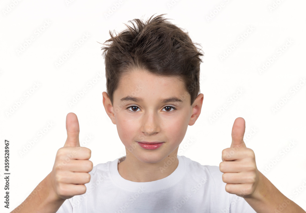Teenage boy in white shirt. Portrait in studio. Funny faces.
