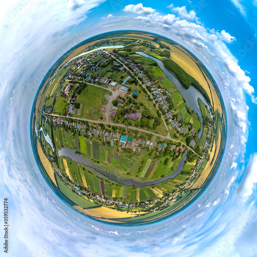 the village of Aleksey-Tenginskaya near the Sredny Zelenchuk River  in the Krasnodar Territory  southern Russia. Aerial little planet panorama  on a summer day