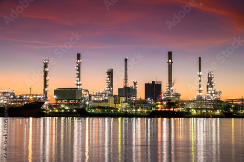 Oil refinery plant from industry  petrochemical oil and gas refinery and pipeline industry with sunrise sky background.