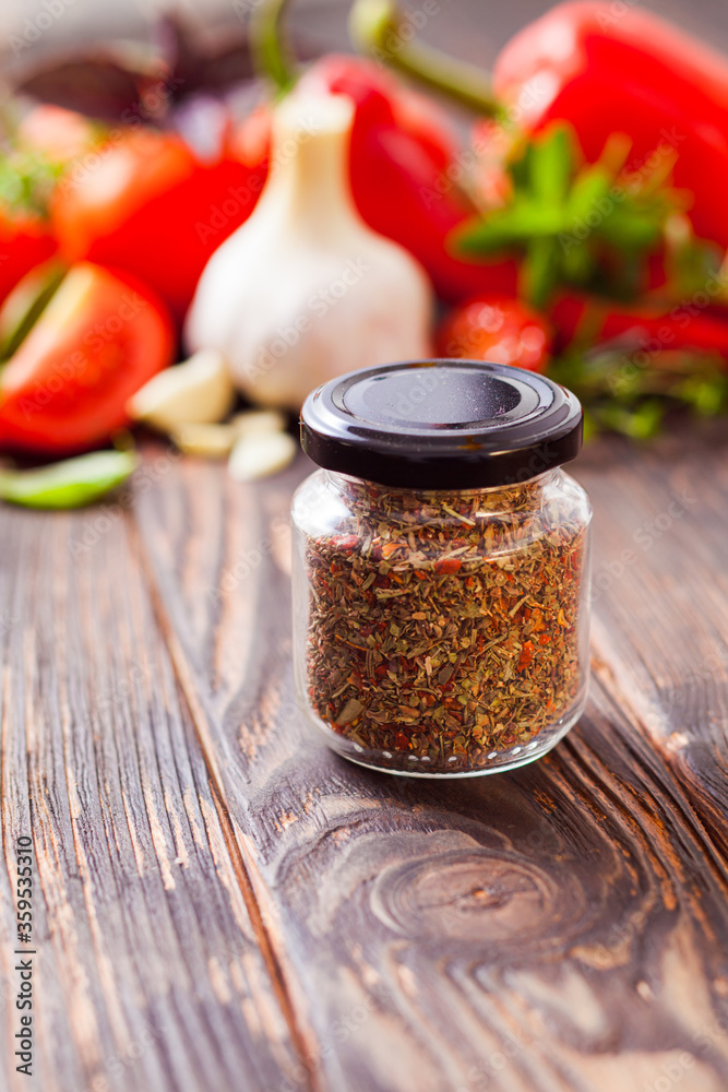Φωτογραφία The traditional fragrant spices of Italian cuisine for making sauce