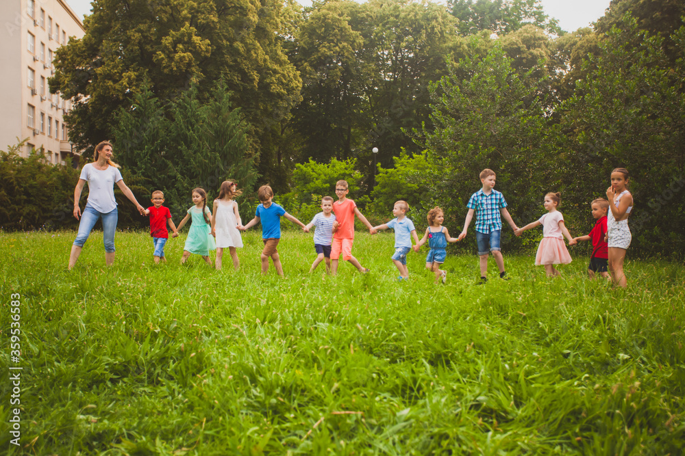 Obraz premium The concept of teambuilding for teacher and kids