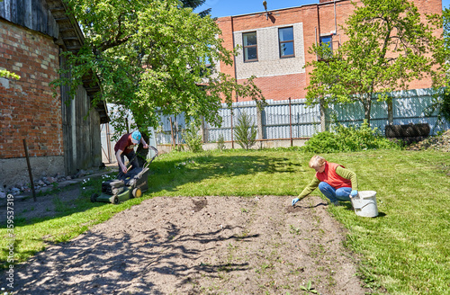 Spring works in the garden on a sunny day