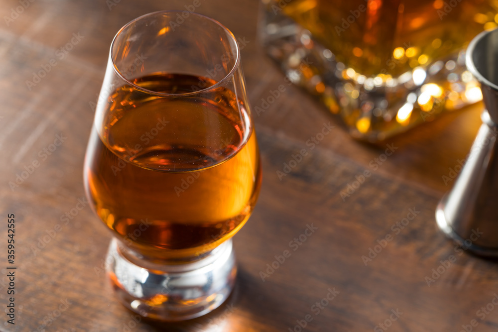 Boozy Amber Whiskey in a Snifter Boozy Amber Whiskey in a Snifter
