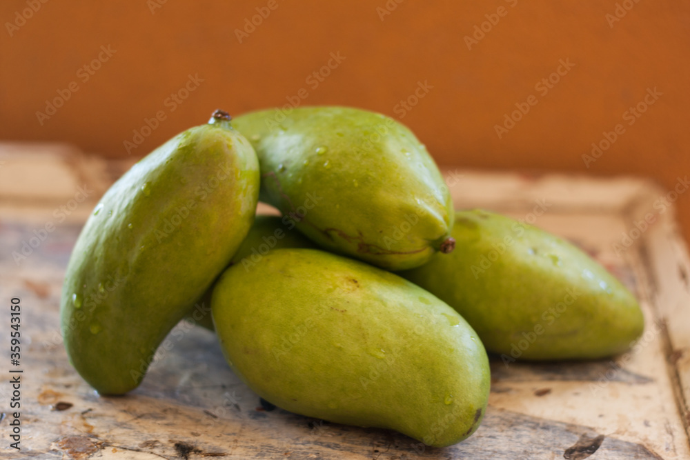 June 22, 2020, La Paz Mexico, green mangoes are the most abundant fruits in the months of July and August. June 22, 2020, La Paz Mexico, green mangoes are the most abundant fruits in the months of July and August.
