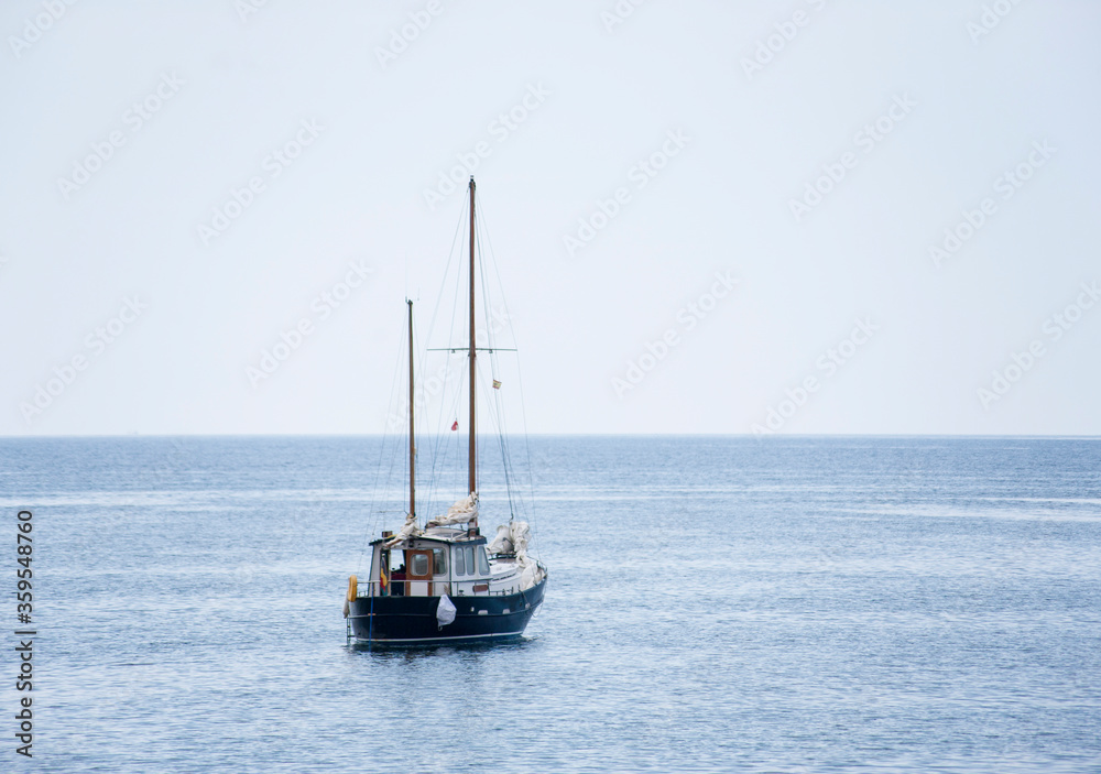 Old sailing ships anchored at the mouth of the port, in the bay of Aguilas, Spain Old sailing ships anchored at the mouth of the port, in the bay of Aguilas, Spain
