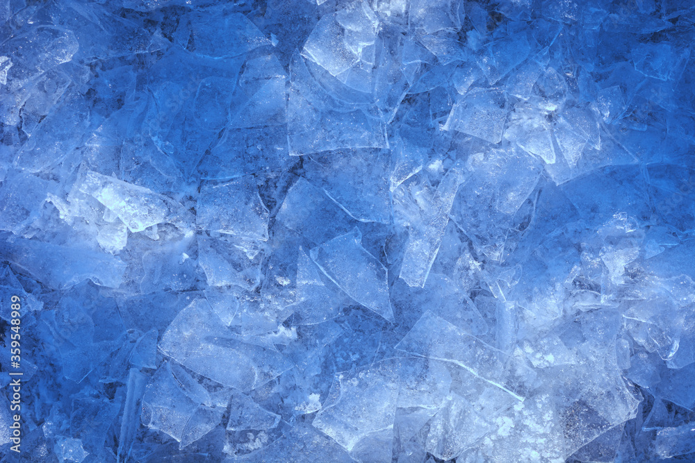 Obraz premium frozen broken ice . abstract winter background.