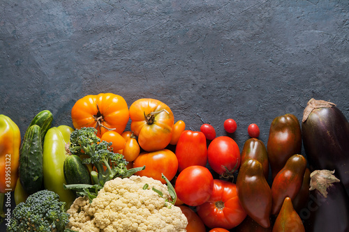 Top view vegetables on a dark background with a copy space. Harvest concept photo