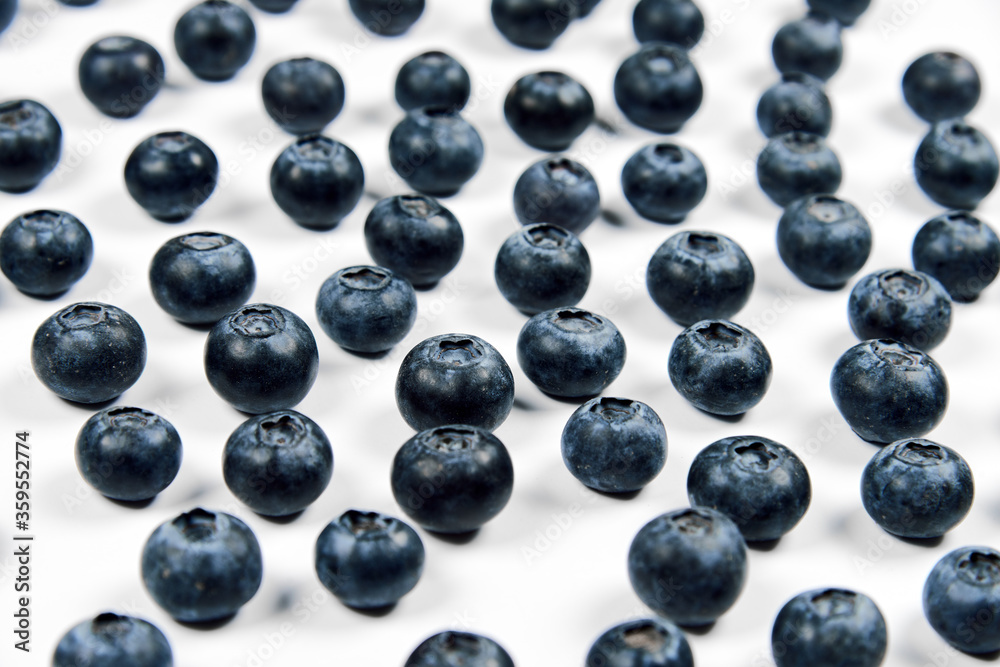 nature and healthy food concept. Top view of fresh blueberries isolated on white nature and healthy food concept. Top view of fresh blueberries isolated on white