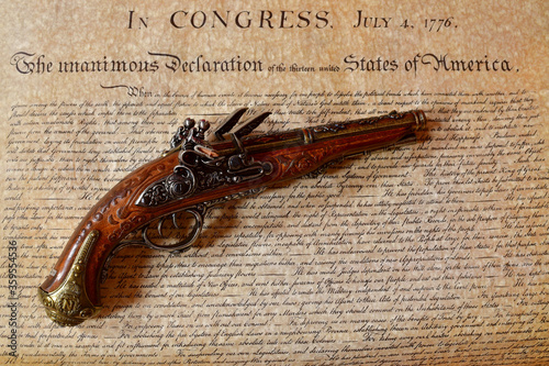 Declaration of Independence with a double barrel flintlock pistol