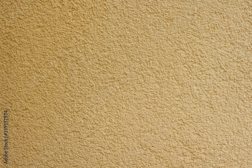 Wallpaper Mural Texture of decorative plaster with a relief. Beige plaster. Close-up. Torontodigital.ca