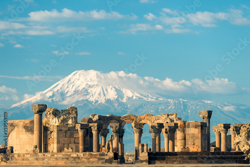 View of Zvartnots Temple on the background of Mount Ararat - a tourist attraction of Armenia photo