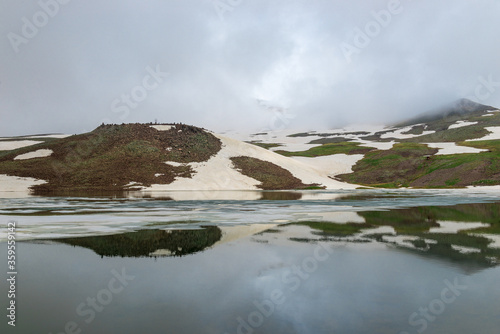 Picturesque Alpine Lake Kari in the mountains of Armenia in summer