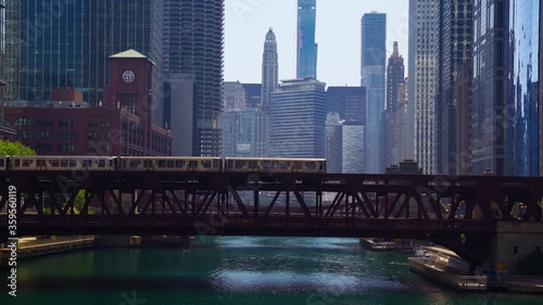 Chicago Loop Elevated Train Line and Bridges passing over Chicago River and Riverfront Downtown photo