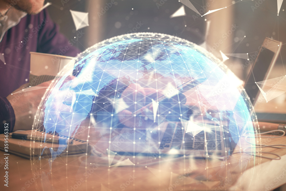 Double exposure of man's hands holding and using a phone and international business theme drawing. Double exposure of man's hands holding and using a phone and international business theme drawing.