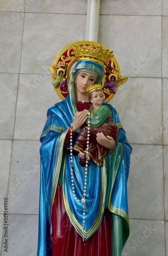 Closeup of Our lady of perpetual help statue virgin Mary with Child Jesus in the church, Thailand. selective focus.