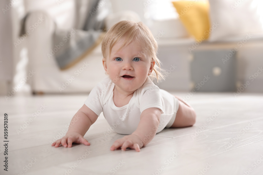 Cute little baby on floor at home Cute little baby on floor at home