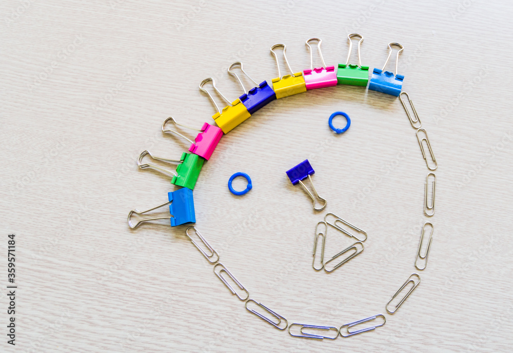Paper clip face with triangle mouth Paper clip face with triangle mouth
