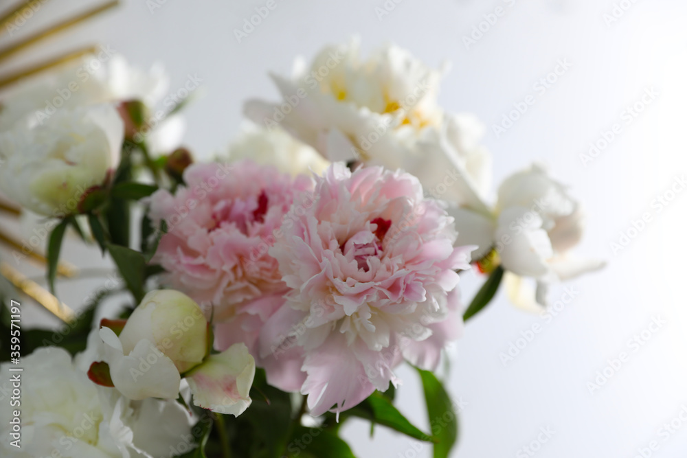 Bouquet of beautiful peony flowers on light background, closeup Bouquet of beautiful peony flowers on light background, closeup