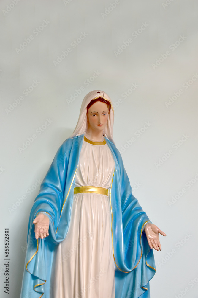 Fototapeta premium Close up of Statue of Our lady of grace virgin Mary in the church, Thailand. selective focus.