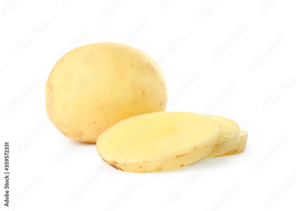 Whole and cut fresh raw organic potatoes on white background Whole and cut fresh raw organic potatoes on white background