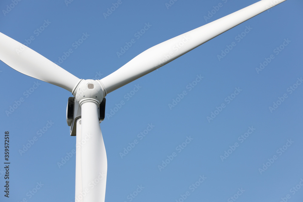Wind turbine against beautiful sky, closeup. Alternative energy source Wind turbine against beautiful sky, closeup. Alternative energy source