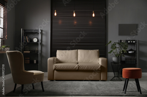 Stylish living room interior with elegant leather sofa © New Africa