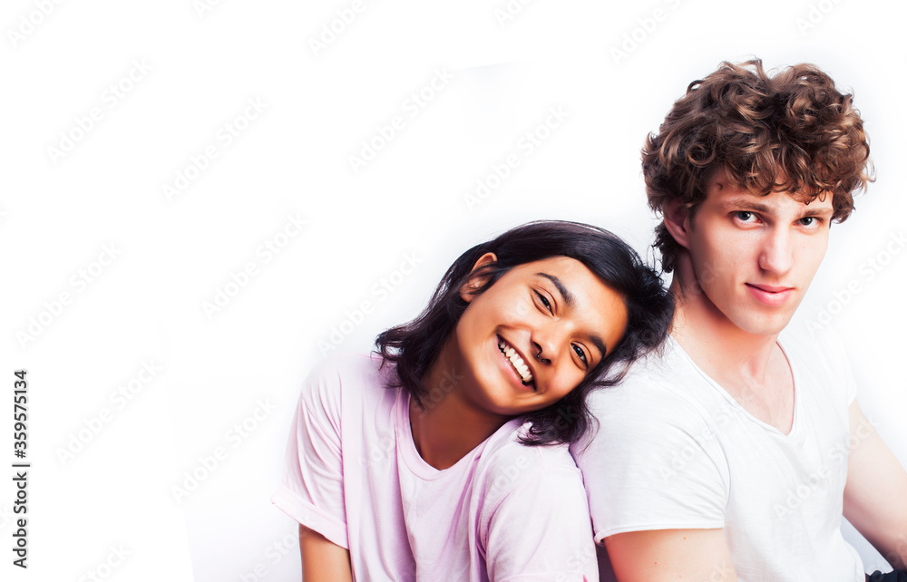 best friends teenage girl and boy together having fun, posing emotional on white background, couple happy smiling, lifestyle people concept, blond and brunette multi nations