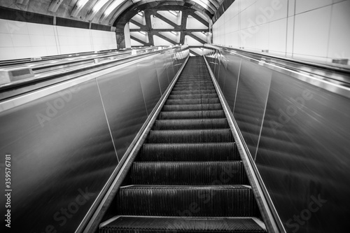 NYC subway escalator view from below. © George_Cade