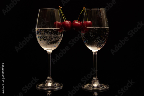 Still life with two glasses and cherry