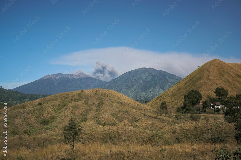 Bondowoso, 26 July 2015 East Java / Indonesia Mount Raung eruption spews lava and ash, pictures taken from Savannah Wurung Crater (Kawah Wurung) during the dry season.