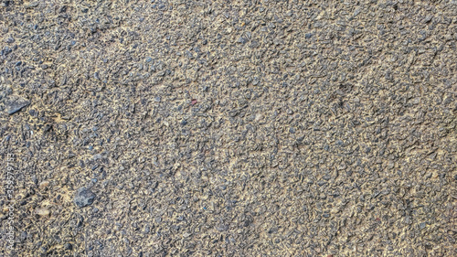 background view of a road having rough surface