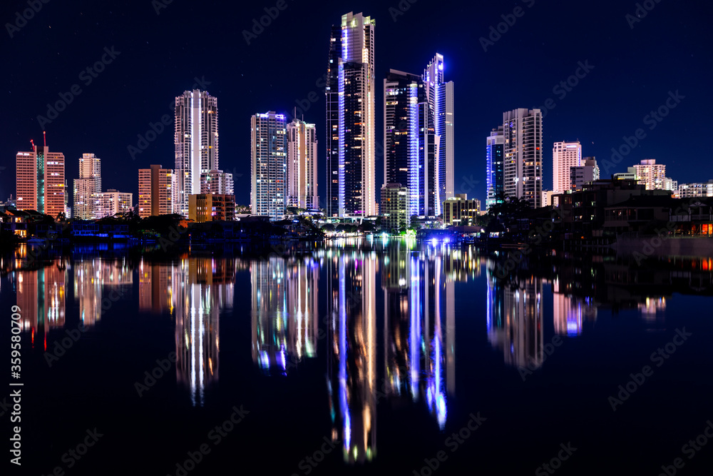 Naklejka premium Surfers Paradise cityscape reflections by night, view from Evandale parklands.