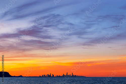 Colourful sunset view of Gold Coast cityscape, view from Currumbin Rock, Gold Coast